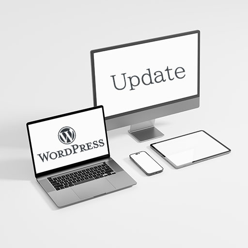 ノートパソコンのディスプレイに表示される WordPress Update 文字
